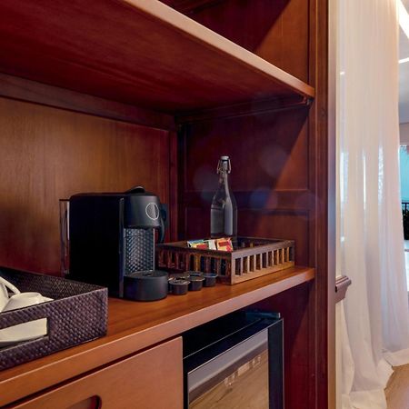 The Mora Zanzibar Hotel Matemwe  Bagian luar foto A Nespresso machine in a hotel room