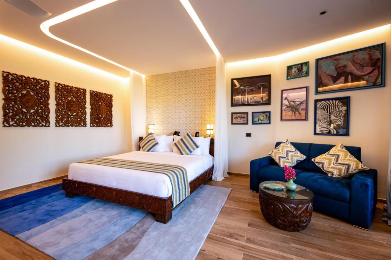 The Mora Zanzibar Hotel Matemwe  Bagian luar foto A bedroom at the hotel