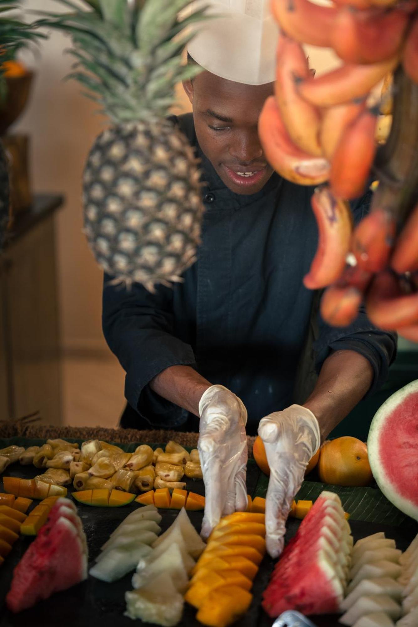 The Mora Zanzibar Hotel Matemwe  Bagian luar foto A chef preparing fruit